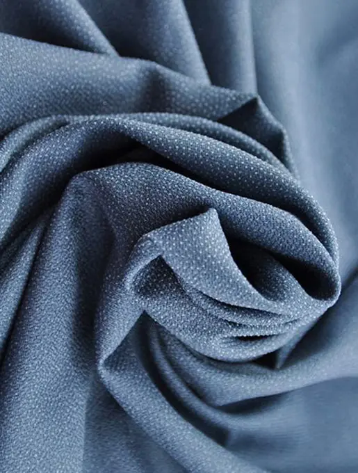 Plain fabric is a simple and versatile type of fabric that is characterized by its plain weave structure. 